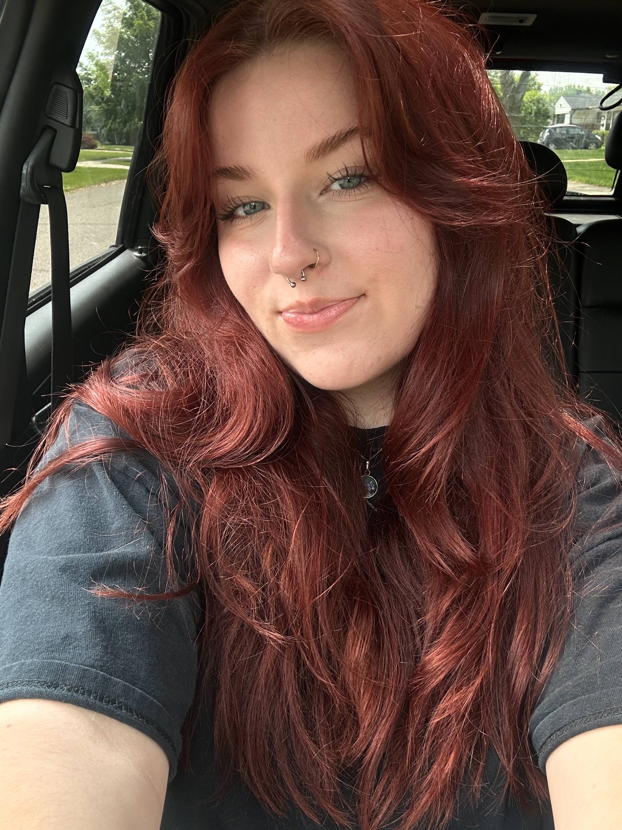 Nora McMaster smiling in a black, t-shirt